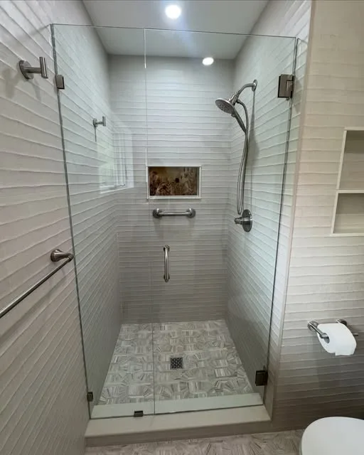 Accessible Walk In shower with grab bar
